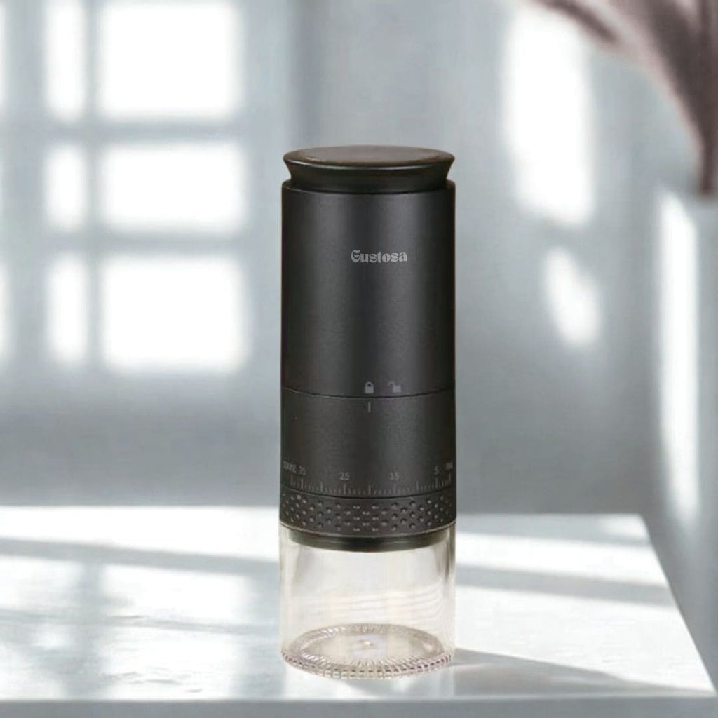 The Gustosa Electric Coffee Grinder in matte black photographed in natural window light on a white surface, showing the precision grind adjustment ring with numbered settings from fine to coarse.