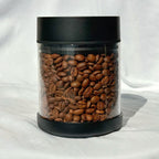 Gustosa electric vacuum container filled with fresh coffee beans